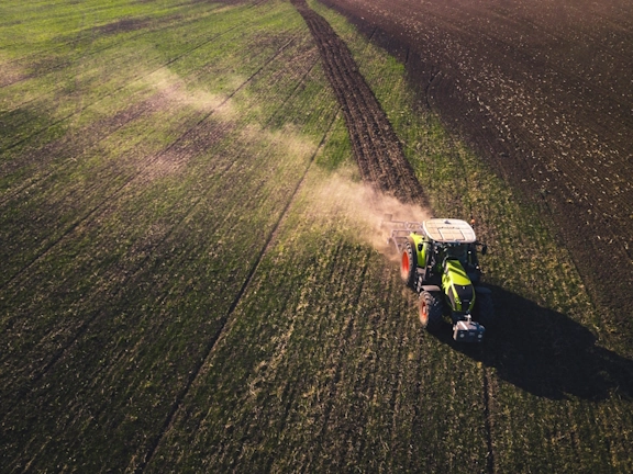 A farmer plows his field. Rural areas of Indiana often have difficulty accessing mental health care.